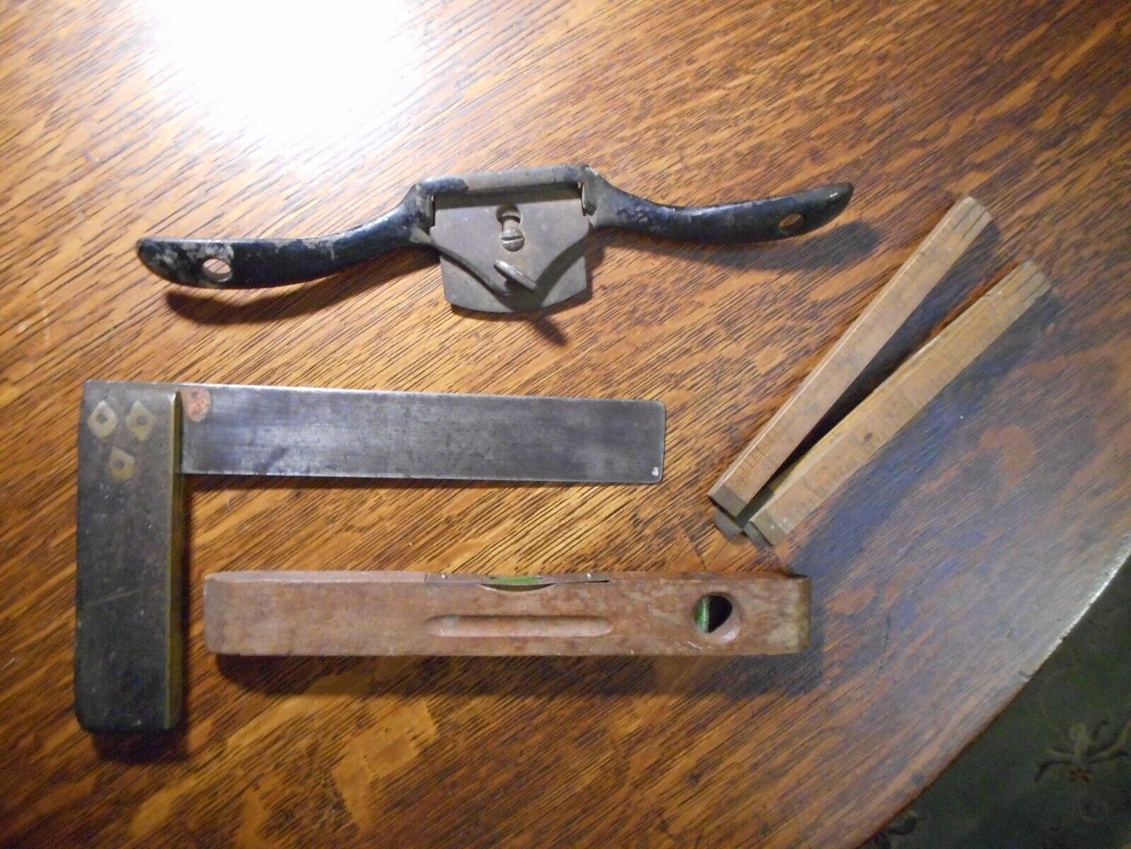 antique hand tool lot / collection; level, square, ruler, draw knife