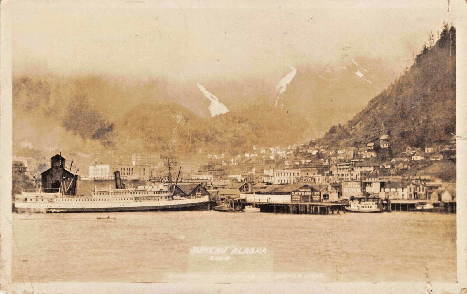 VTG RPPC Photo Postcard Juneau Alaska Town View Ship Boat Store Ad Sign Movie AK