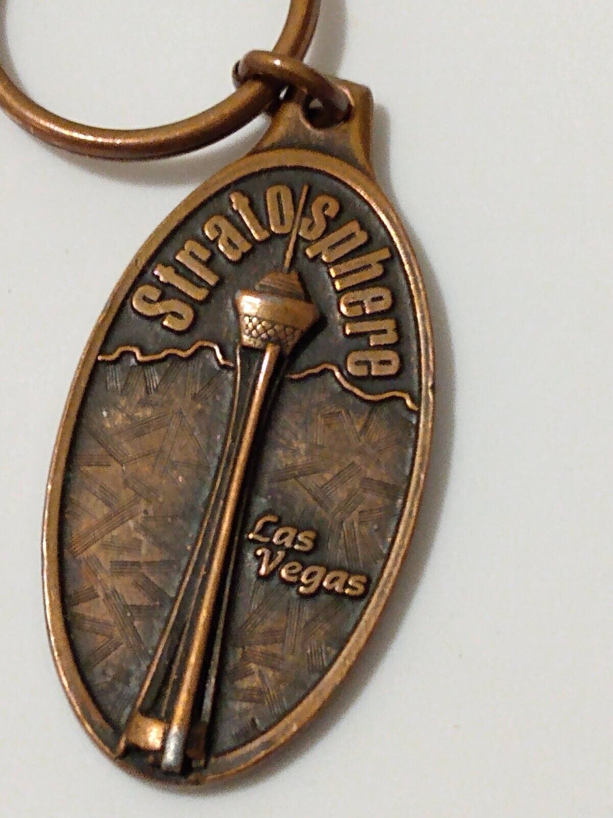 Stratosphere Las Vegas Bronze Tone Oval Souvenir Keychain