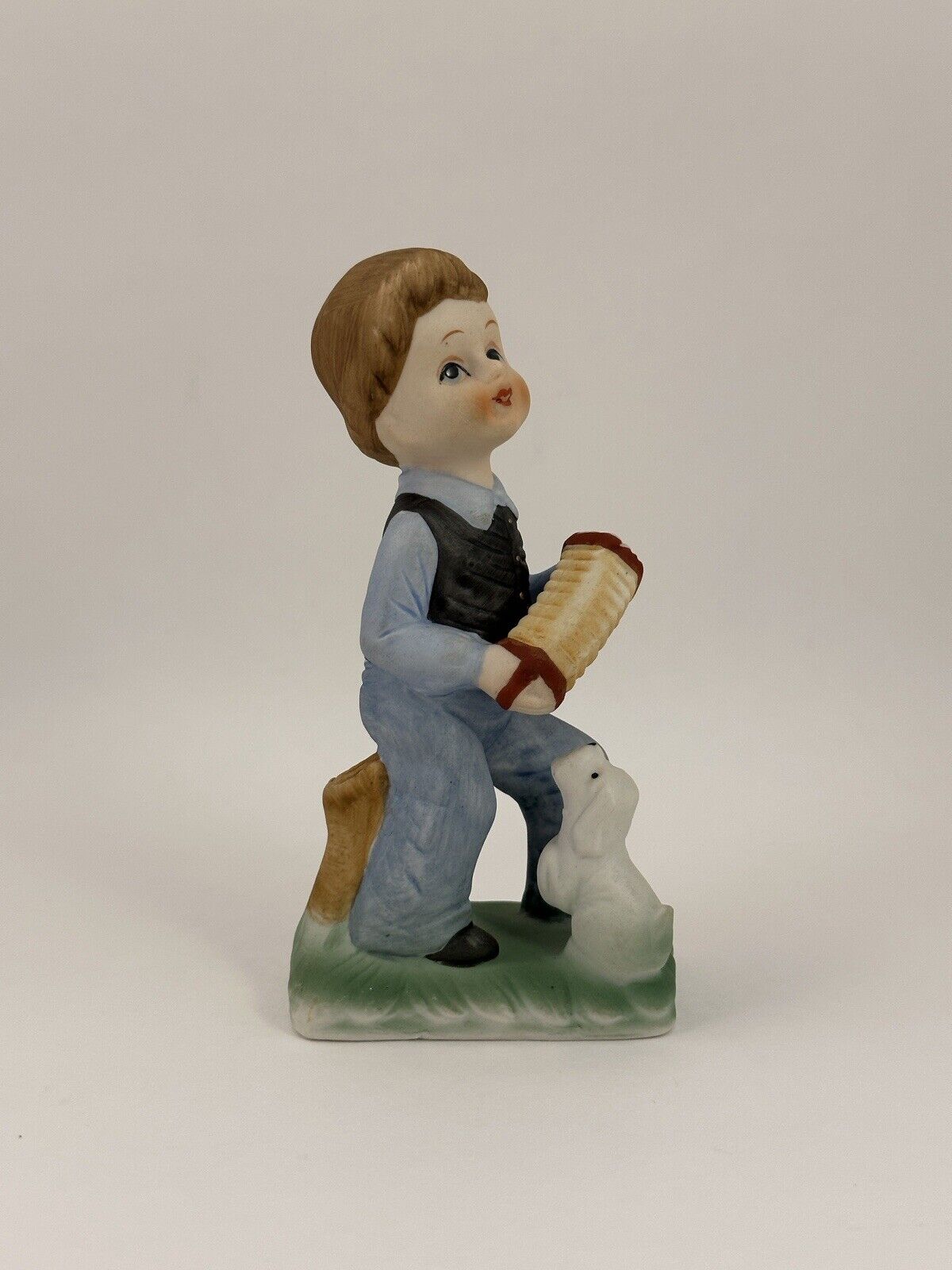 Vintage Boy with Dog Playing Accordion Porcelain Figurine