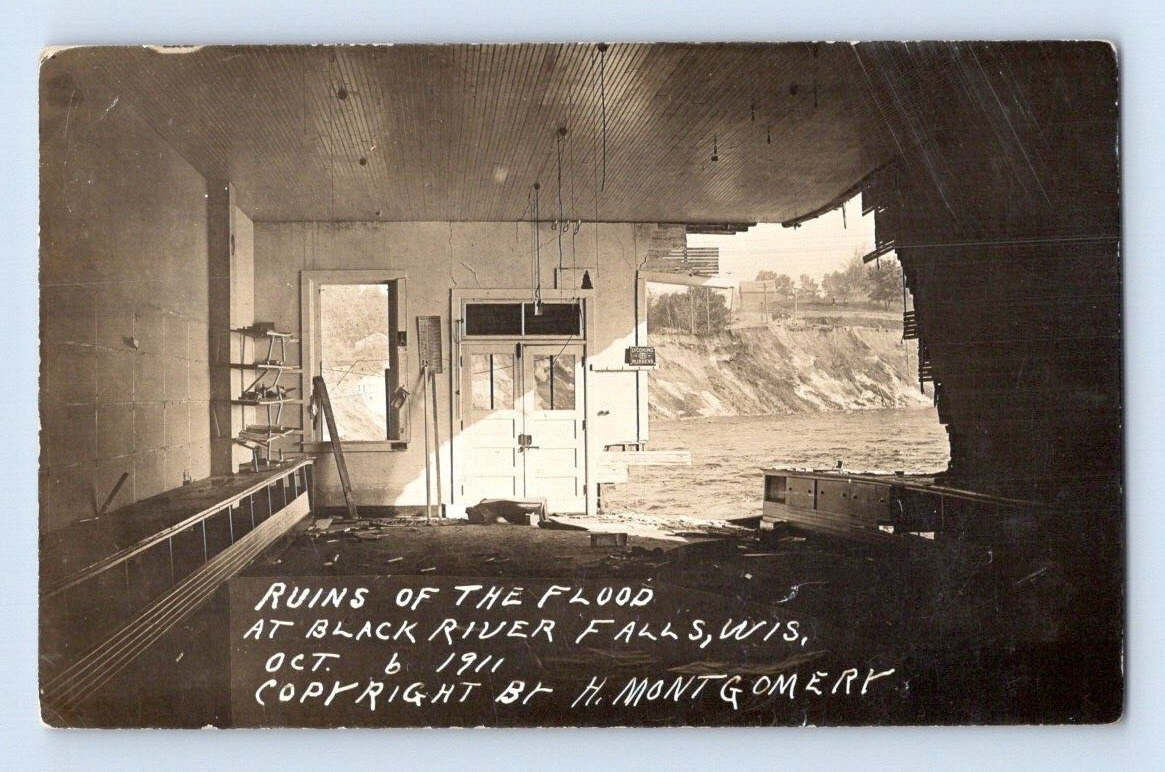RPPC 1912. RUINS OF FLOOD AT BLACK RIVER FALLS, WIS. 1911. POSTCARD. 1A38