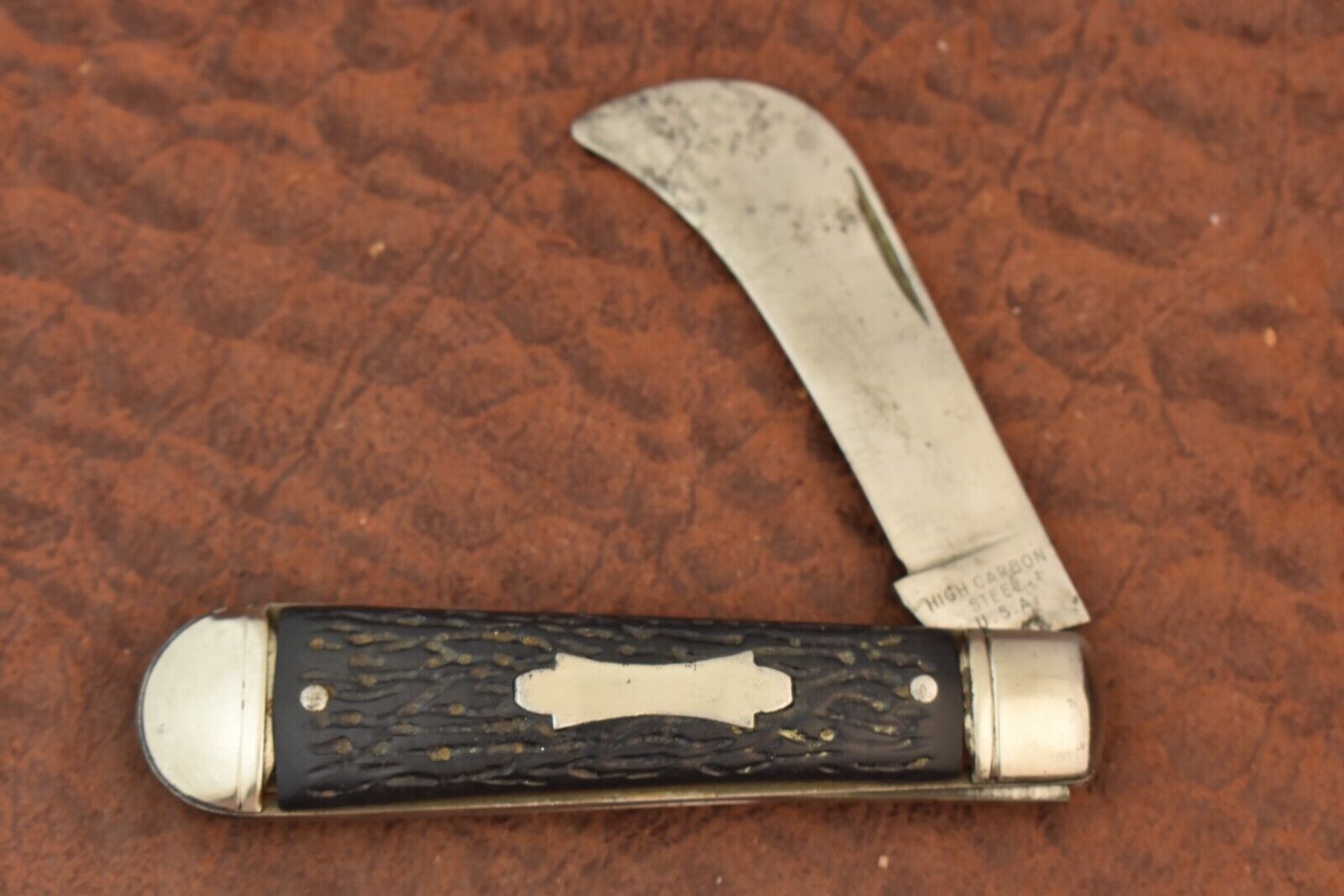 VINTAGE c1930's HIGH CARBON STEEL USA JIGGED BLACK PLASTIC HAWKBILL KNIFE (16420