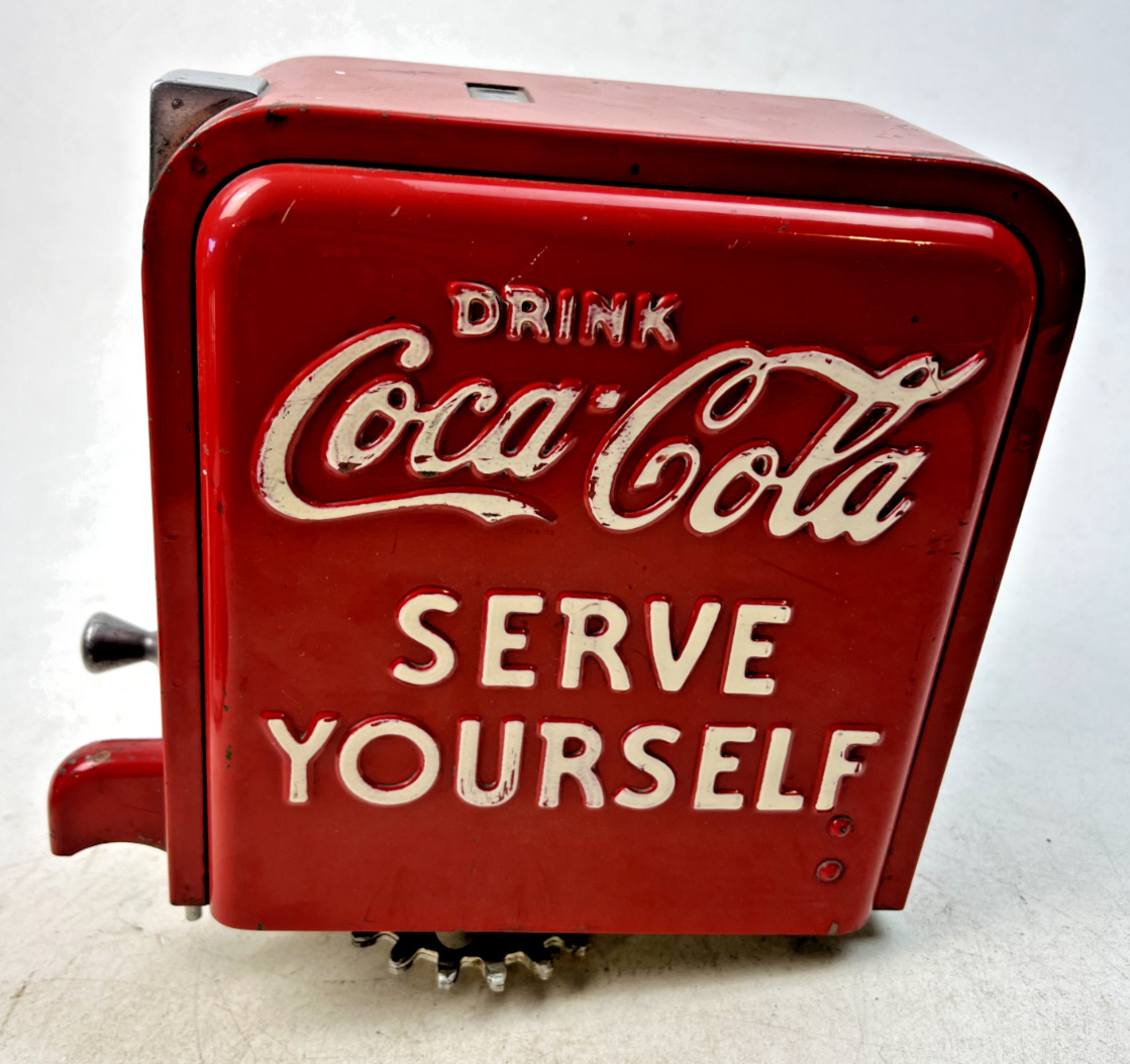 Vintage Embossed Coca-Cola Vendo Head