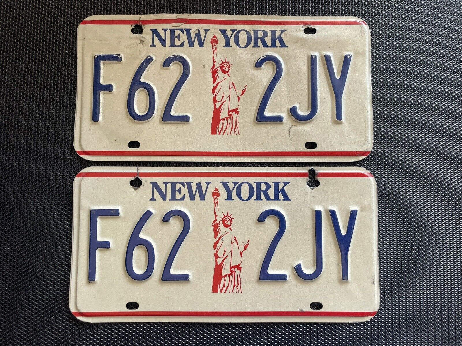PAIR OF NEW YORK LICENSE PLATES STATUE OF LIBERTY F62 2JY