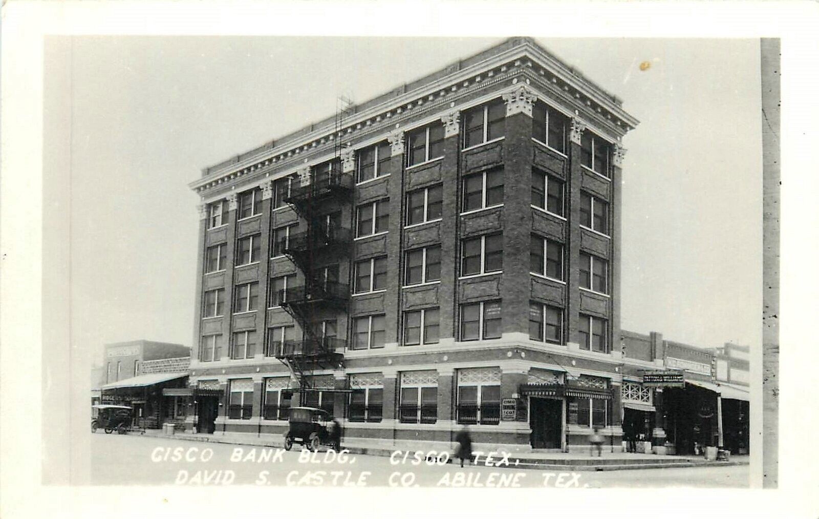 Postcard 1940s RPPC Texas Cisco Bank Building autos Castle Occupation 23-13455