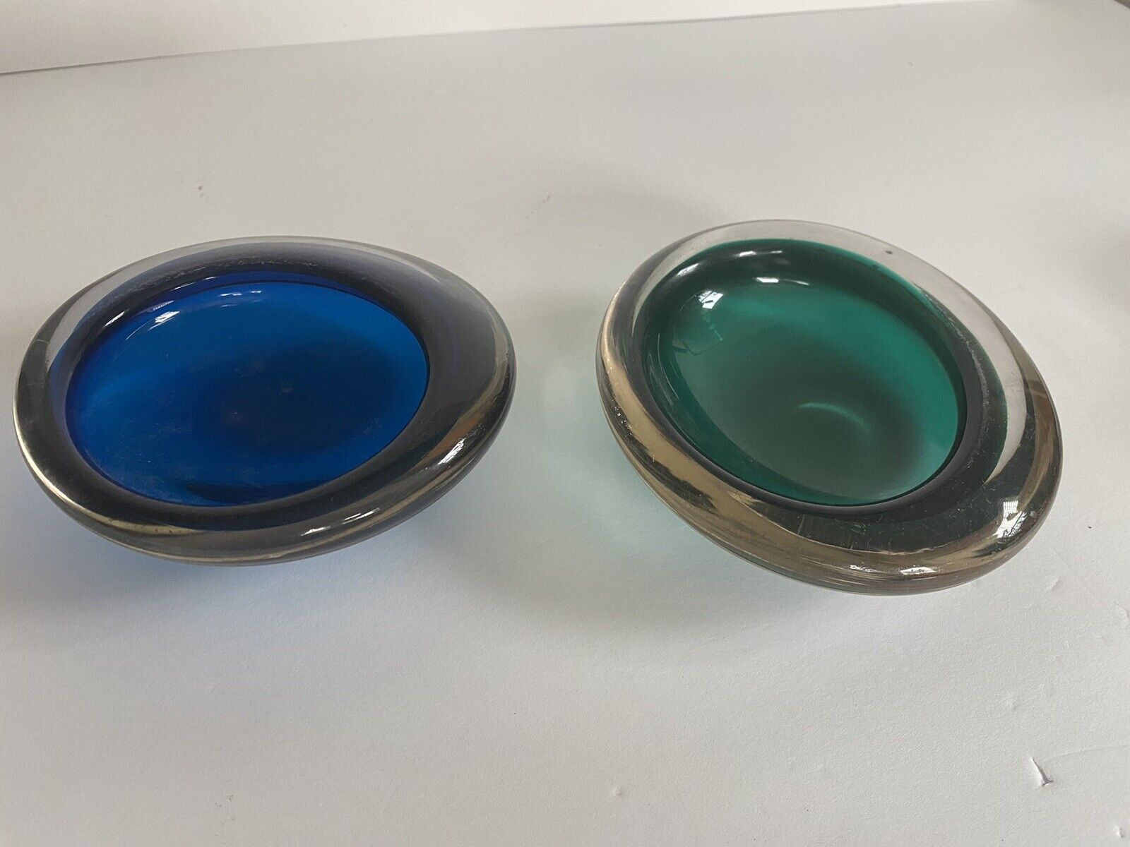 Two Mid Century Oval Art Glass Ashtrays - Nice Heavy Glass.