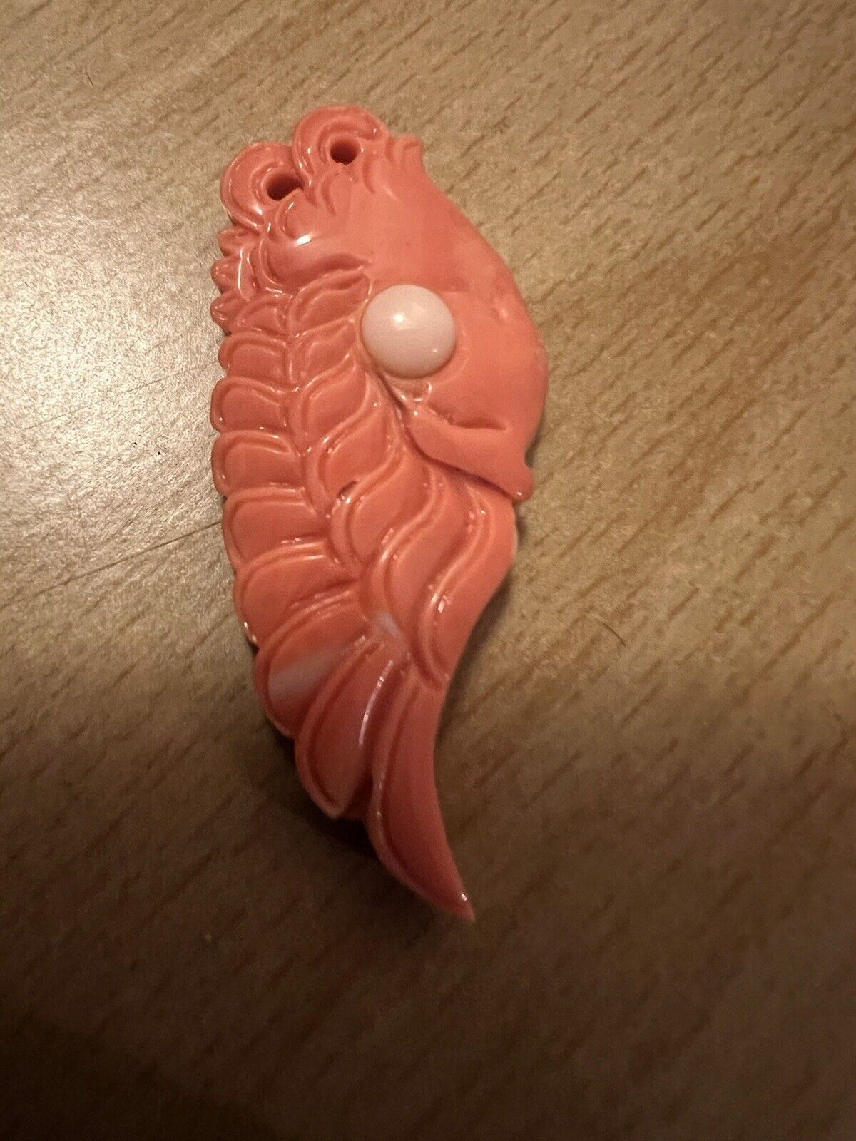 Natural red coral carved angel wings 7.4g