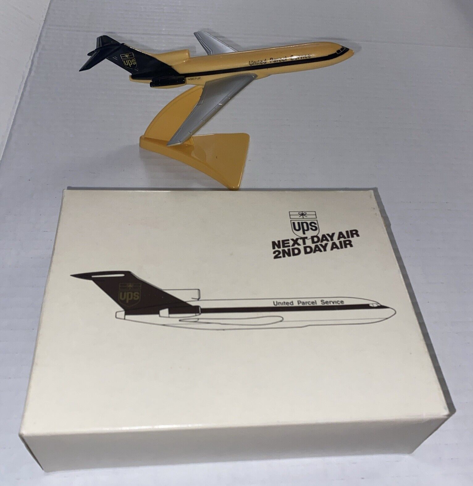 UPS United Parcel Service B727-100 Plastic Plane Model In Box N907UP w Stand
