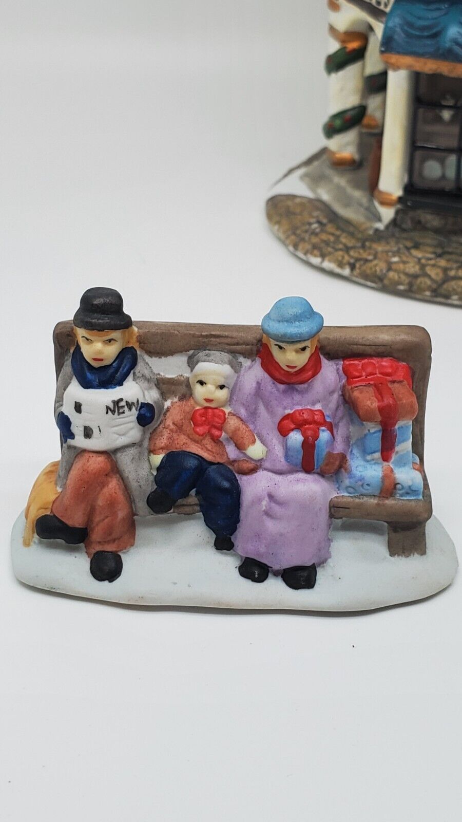Christmas Village Bench Sitting Family w/Packages 3\