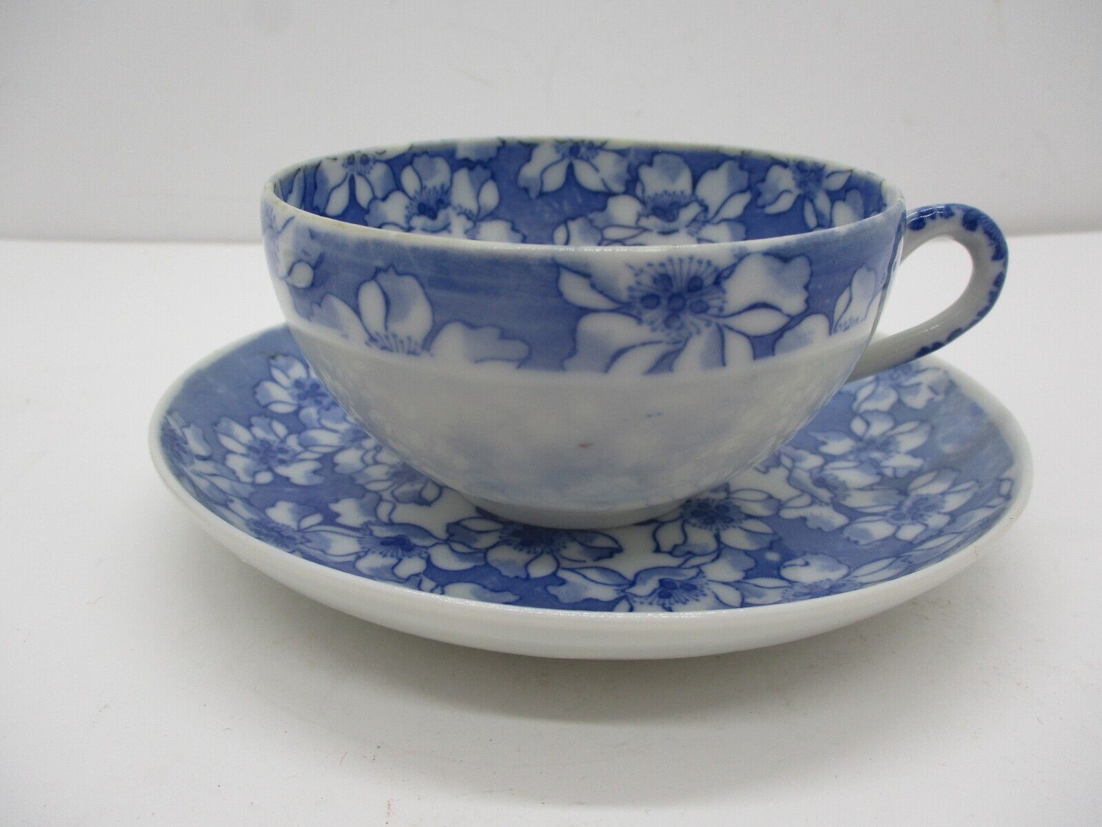Vintage Signed Asian Blue and White Tea Cup and Saucer