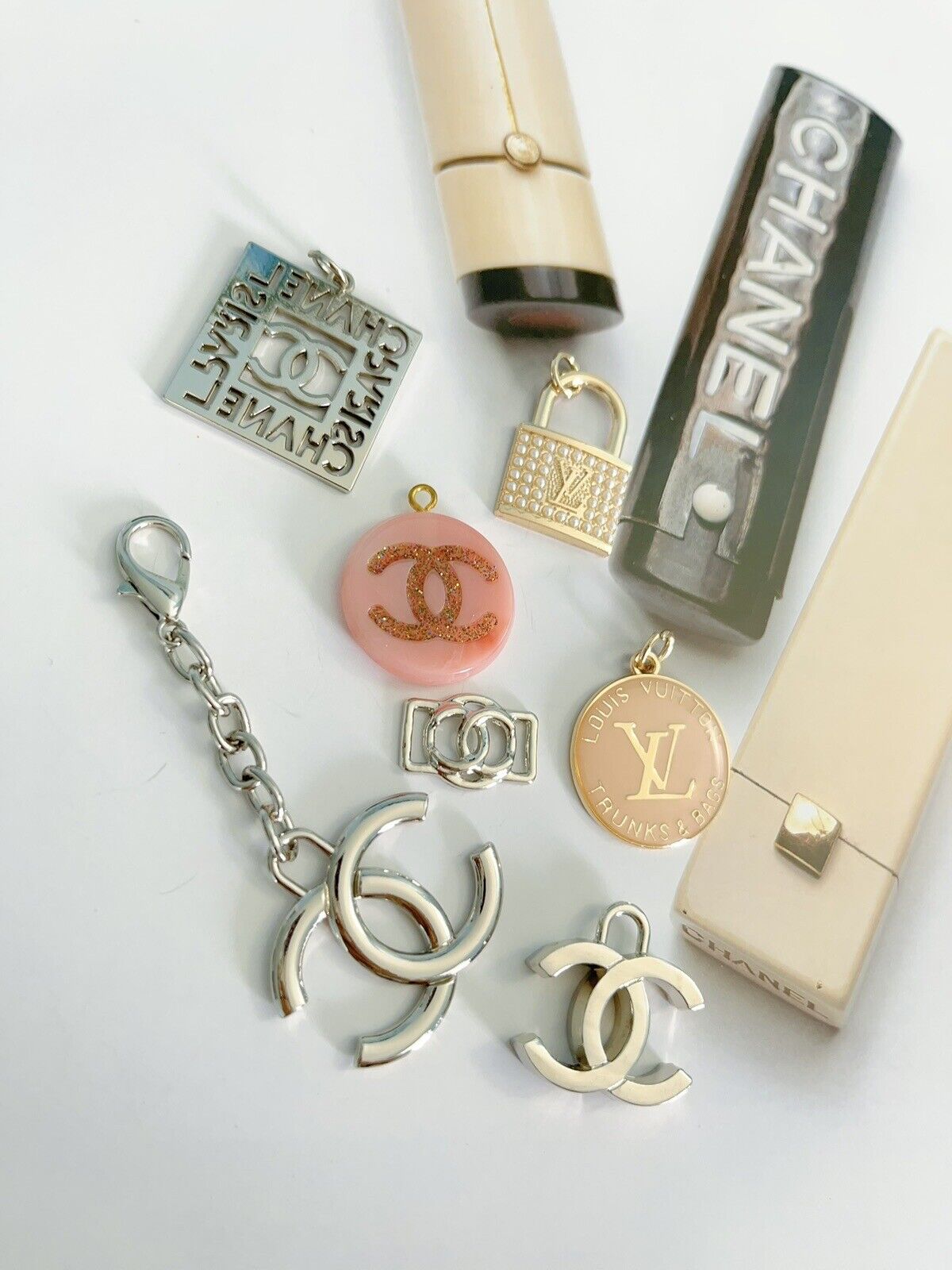 Lot of 8 Chanel buttons and zipper Pulls