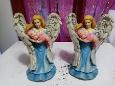 Set Of 2 Angel Winged Figurines Holding A Baby picture