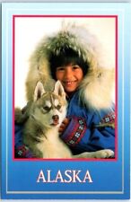 Postcard - Alaskan native girl with husky puppy - Alaska picture