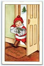 1915 New Year Greetings Little Girl Holding Gift Present Embossed Postcard picture