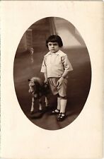 CPA AK Child with a Toy Horse CHILDREN WITH TOYS (1327527) picture