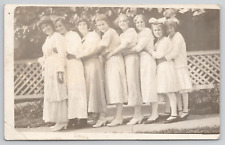 RPPC  Group Of Young Women Wearing White On Sidewalk c1910 Real Photo Postcard picture