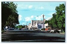 c1960's Downtown Flags Shops Cars Buildings Scene Orlando California CA Postcard picture