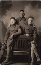 1910s Studio RPPC Photo Postcard Three Affectionate Young Soldiers with Cigars picture