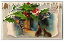 c1910's Happy Christmas Rabbit Holly Berries Embossed Posted Antique Postcard picture