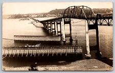 Hudson Wisconsin~Interstate Toll Bridge~Span & Dike~Small Steamer~c1913 RPPC picture
