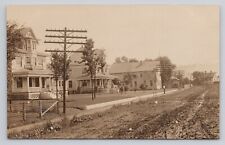 Postcard RPPC Street Scene Telephone Poles Residences homes Dirt Road  c1918 picture