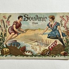 Antique Embossed Postcard Beautiful Beach Scene Man & Woman Swimsuits Shells picture