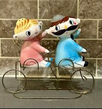 Vintage Relco Girl And Boy Shakers On Bike picture