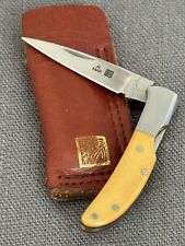 Vintage Al Mar Knife 1001 Osprey. Ivory  Color Paper Micarta.  W/Leather Slip picture