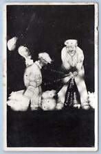RPPC GOLF PLAYER SWING KNOCKS HAT OFF CADDY BIZARRE UNUSUAL ACTION POSTCARD picture