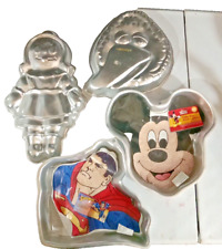 Lot of 4 cartoon character cake pans picture
