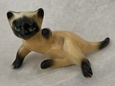 Mini Ceramic Siamese Cat Figurine Reaching w/ One Paw  picture