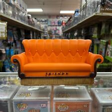 Warner Bros. WB Friends - Couch PVC Bank, Orange Coin Piggy Saving Bank  picture