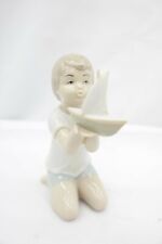 Porcelain Boy Holding Sail Boat Made in Spain 6.1