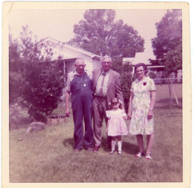 Vtg 1970s Found Photo Family Posing in Yard Little Girl Pigtails Snapshot