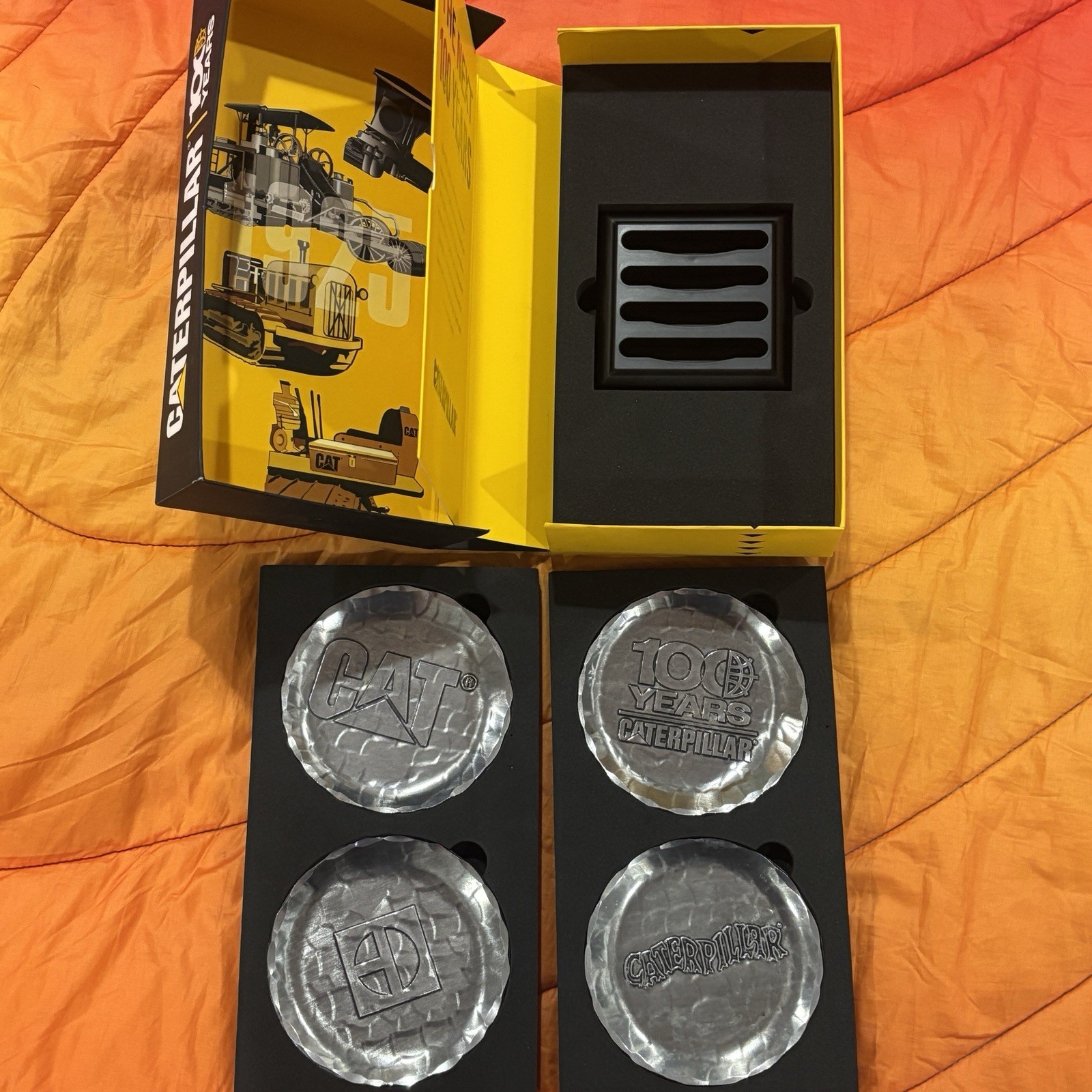 CATERPILLAR 100 Years Anniversary Coaster Set w/ Display Box & Stand CATERPILLAR 100 Years Anniversary Coaster Set w/ Display Box & Stand