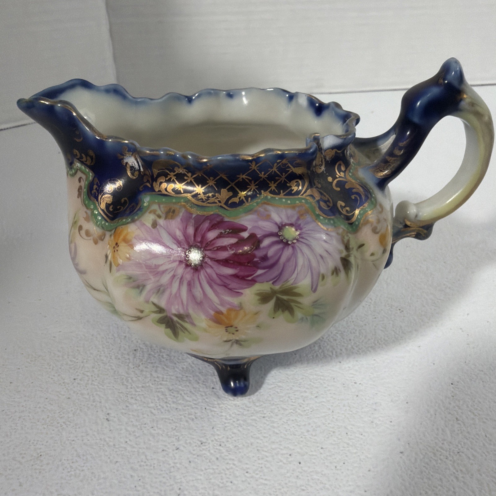 ANTIQ ROYAL NIPPON PORCELAIN COBALT BLUE FLORAL MOTIF GOLD GILDED FOOTED CREAMER