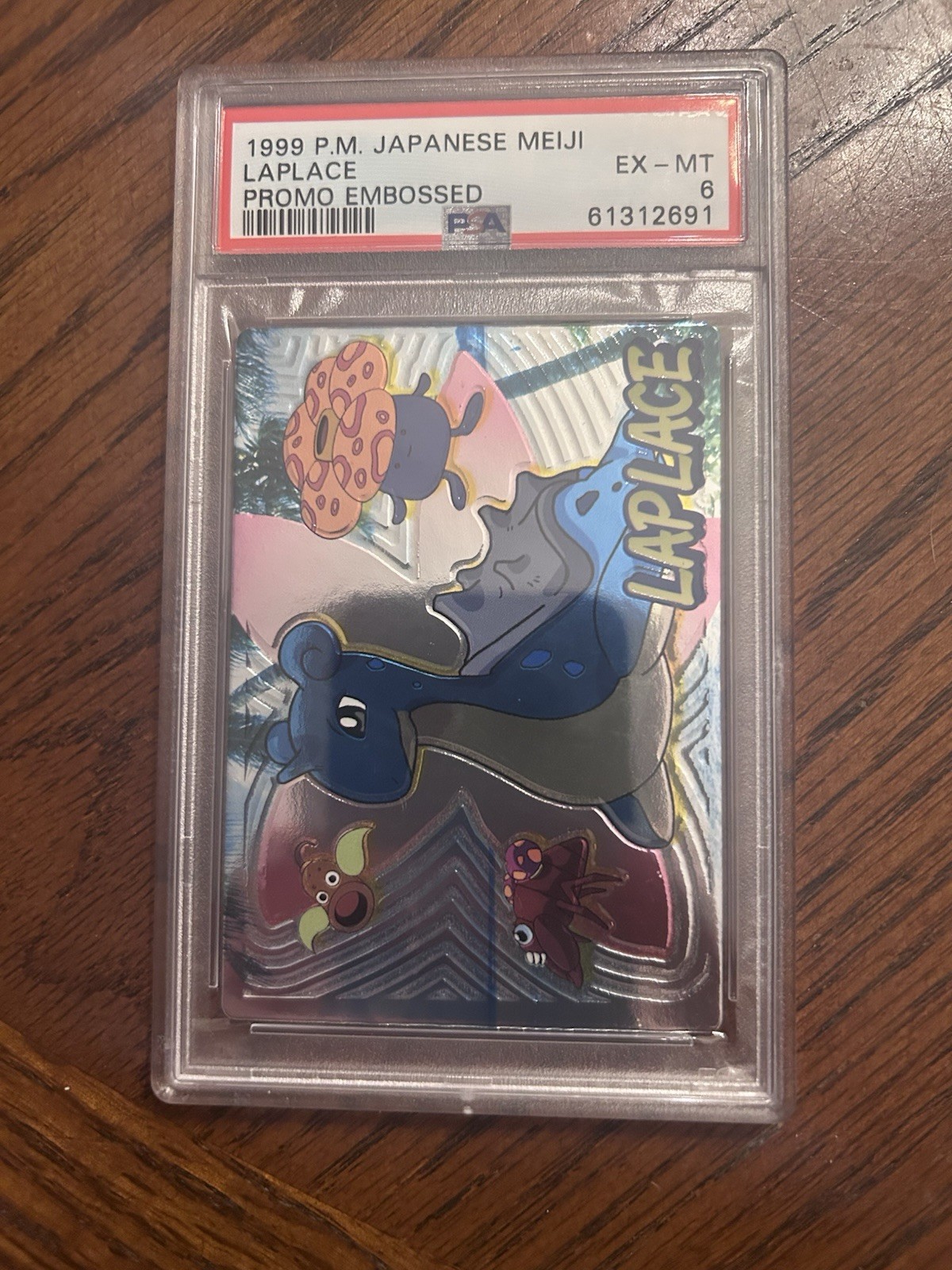 PSA 6 Lapras Pokémon Meiji 1999 Japanese Promo Embossed Cert 61312691