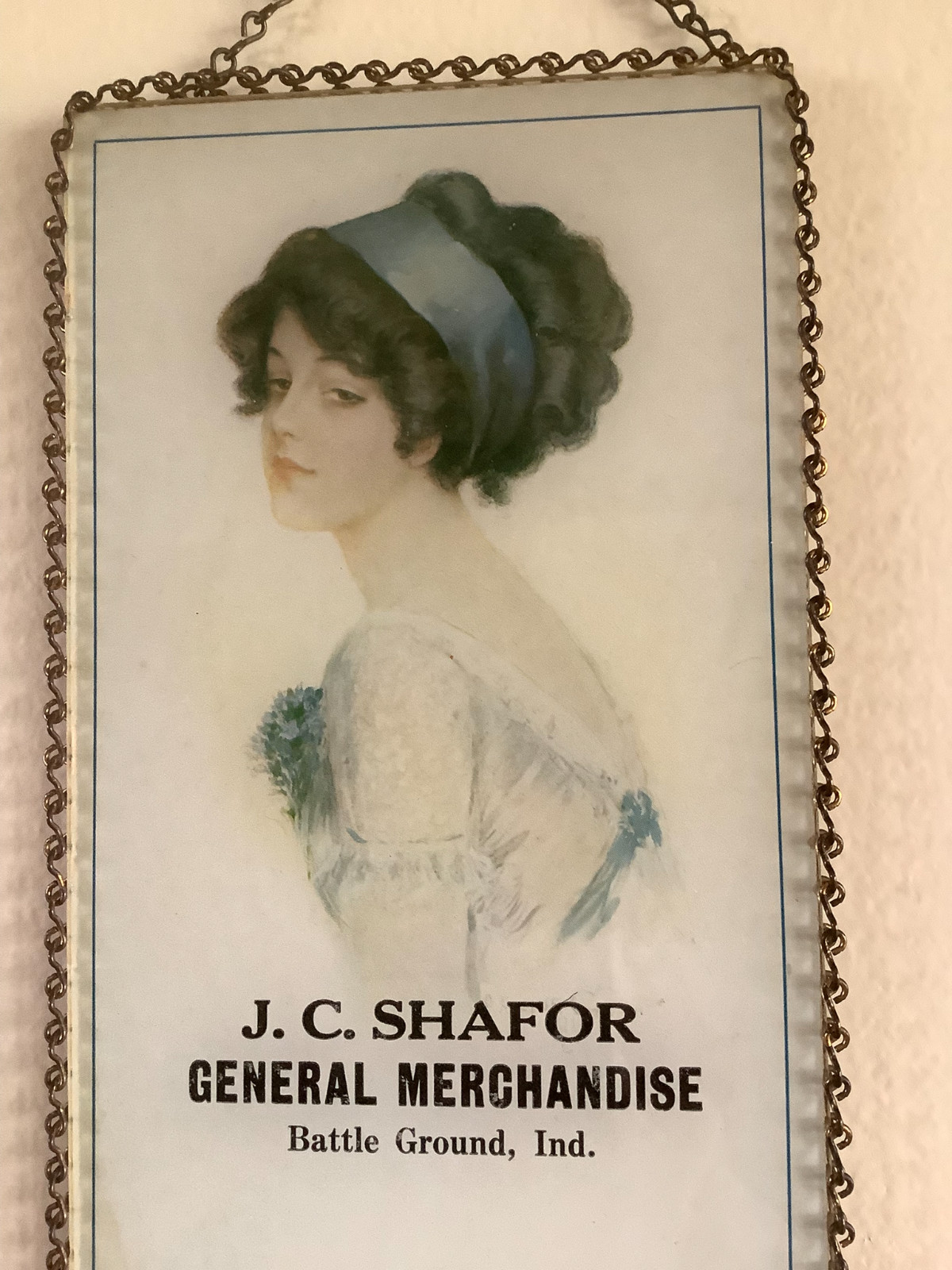 Antique 1912 advertising in chain frame under glass for store Battle Ground, IN