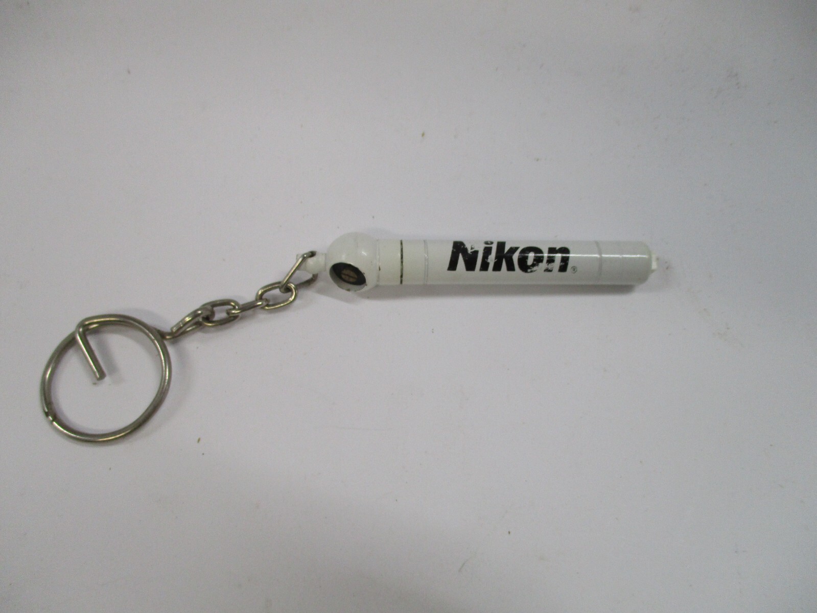 Vintage Nikon Tire Pressure Gauge – Promotional 1990s Camera-Themed Collector’s 