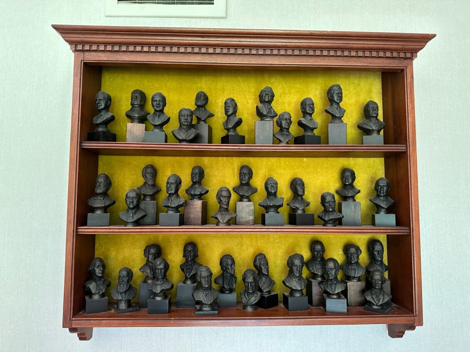 Presidential Bronzes collection display (38 mini bronze busts of US presidents)