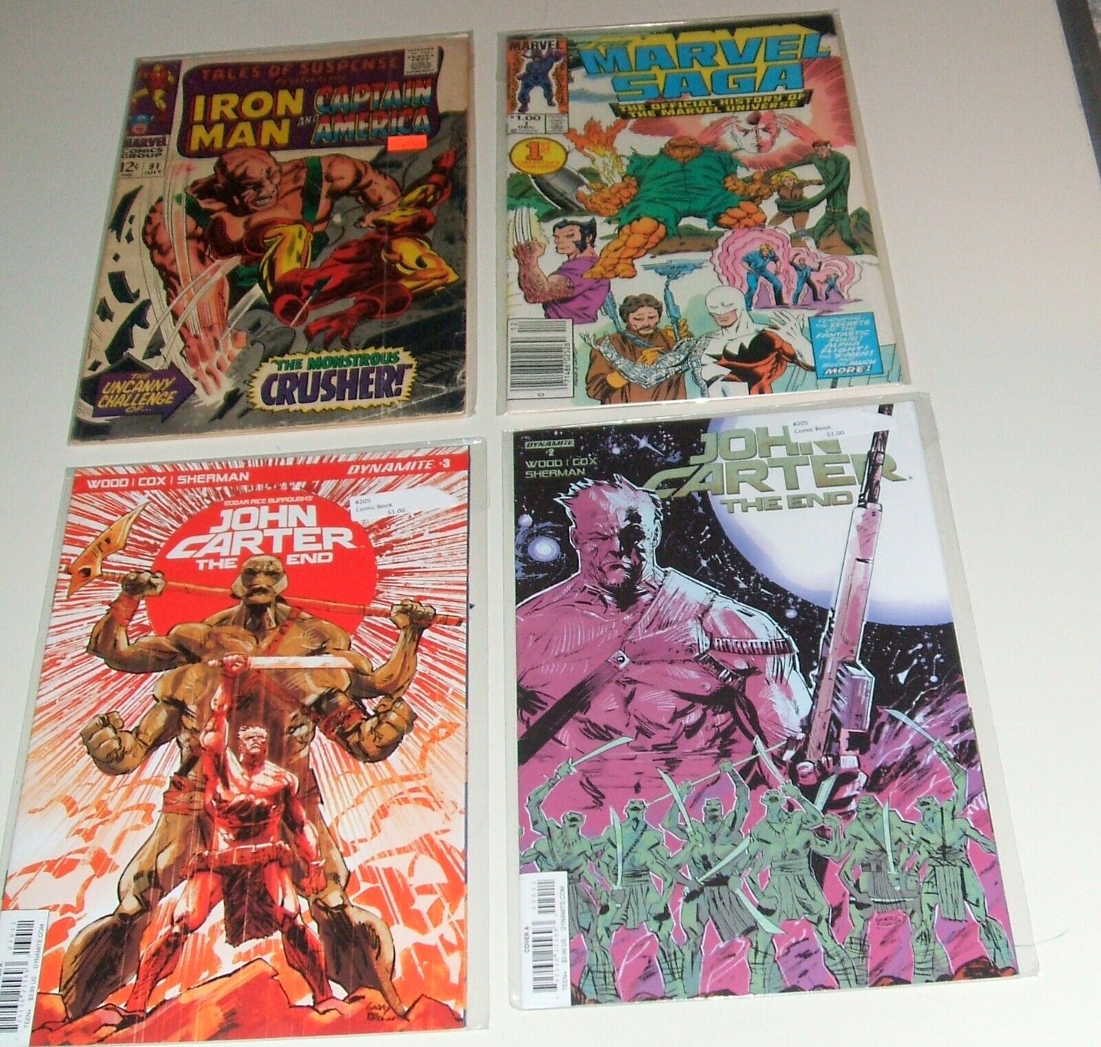 Marvel and Dynamite Comics Lot of 4 Iron Man, Marvel Saga and 2 John Carters