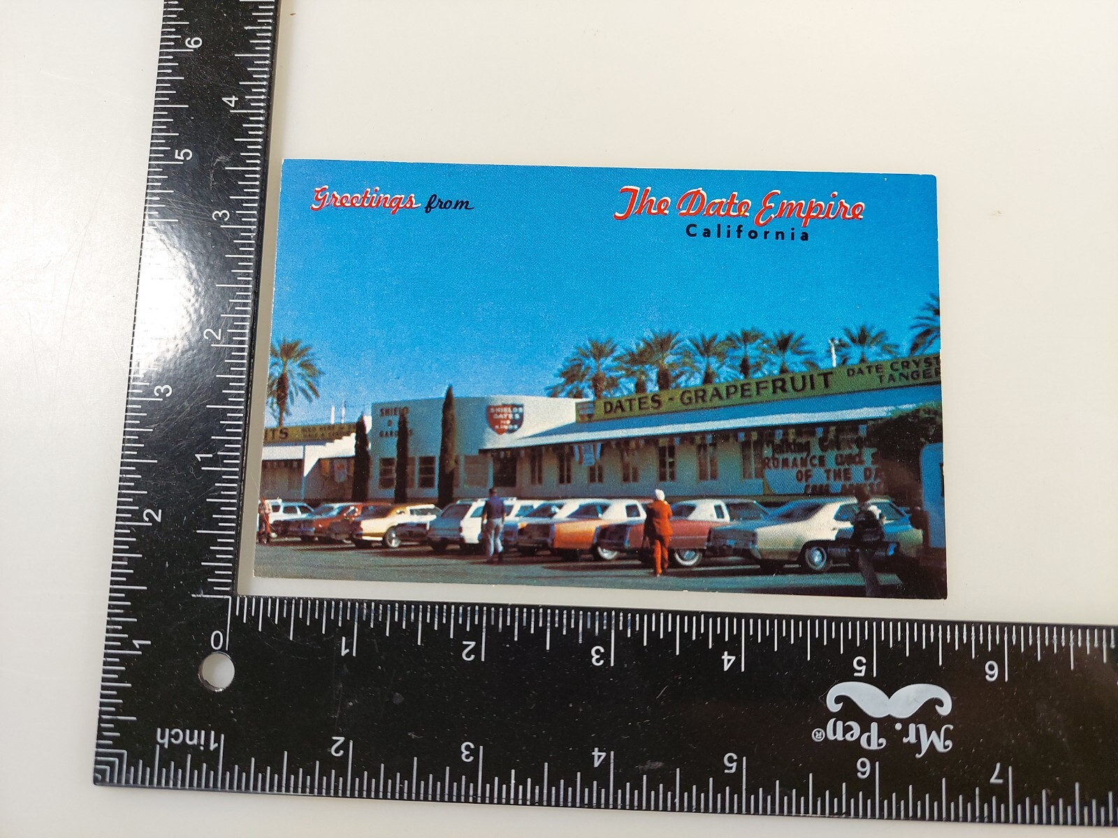  INDIO, CA. SHIELDS DATE GARDEN & SHOWROOM, WOODY AUTOMOBILE POSTCARD📬📨