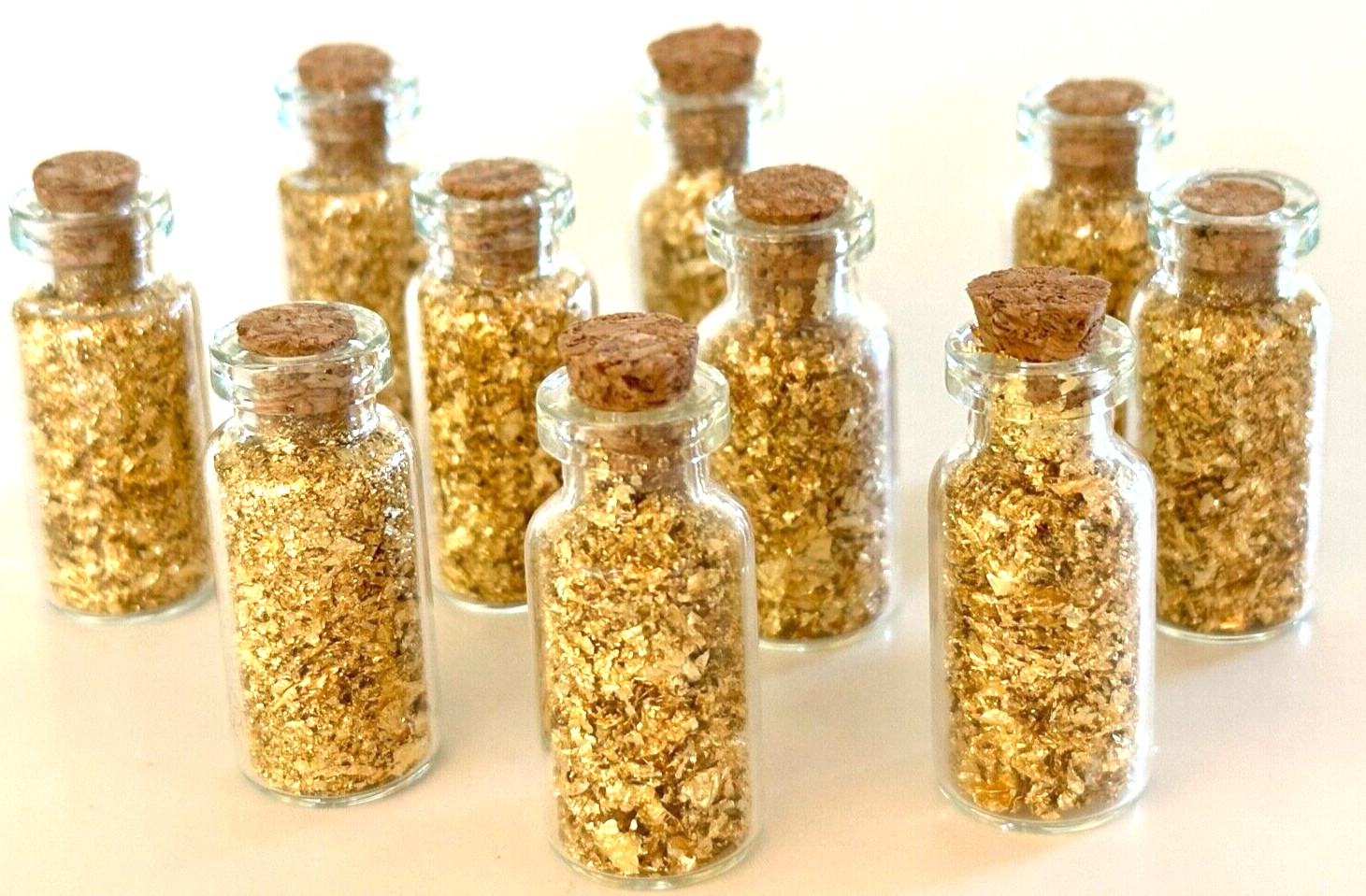 10 Bottles of Large Gold Flakes .....