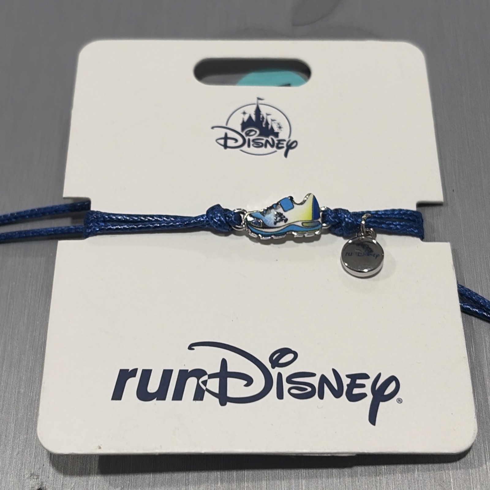 NWT Run Disney Disney Parks Bracelet RunDisney W/ Blue sneaker Charm authentic NWT Run Disney Disney Parks Bracelet RunDisney W/ Blue sneaker Charm authentic