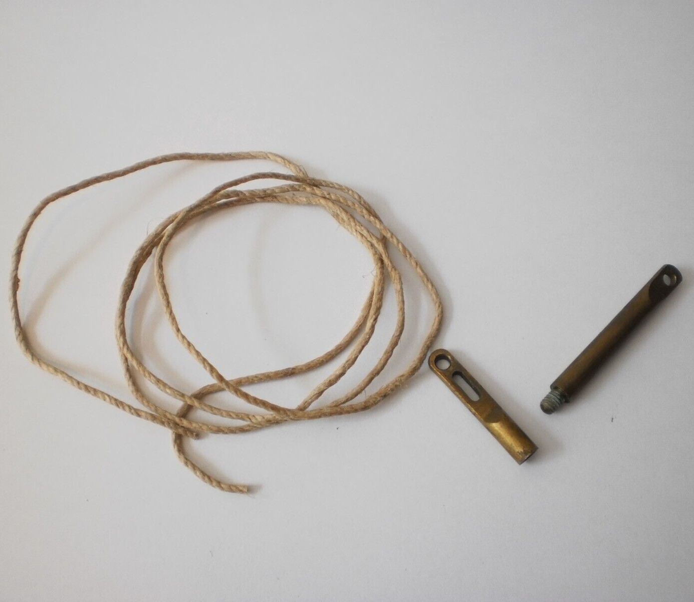 Four (4) WW1 Brass Cleaning Thong NOS