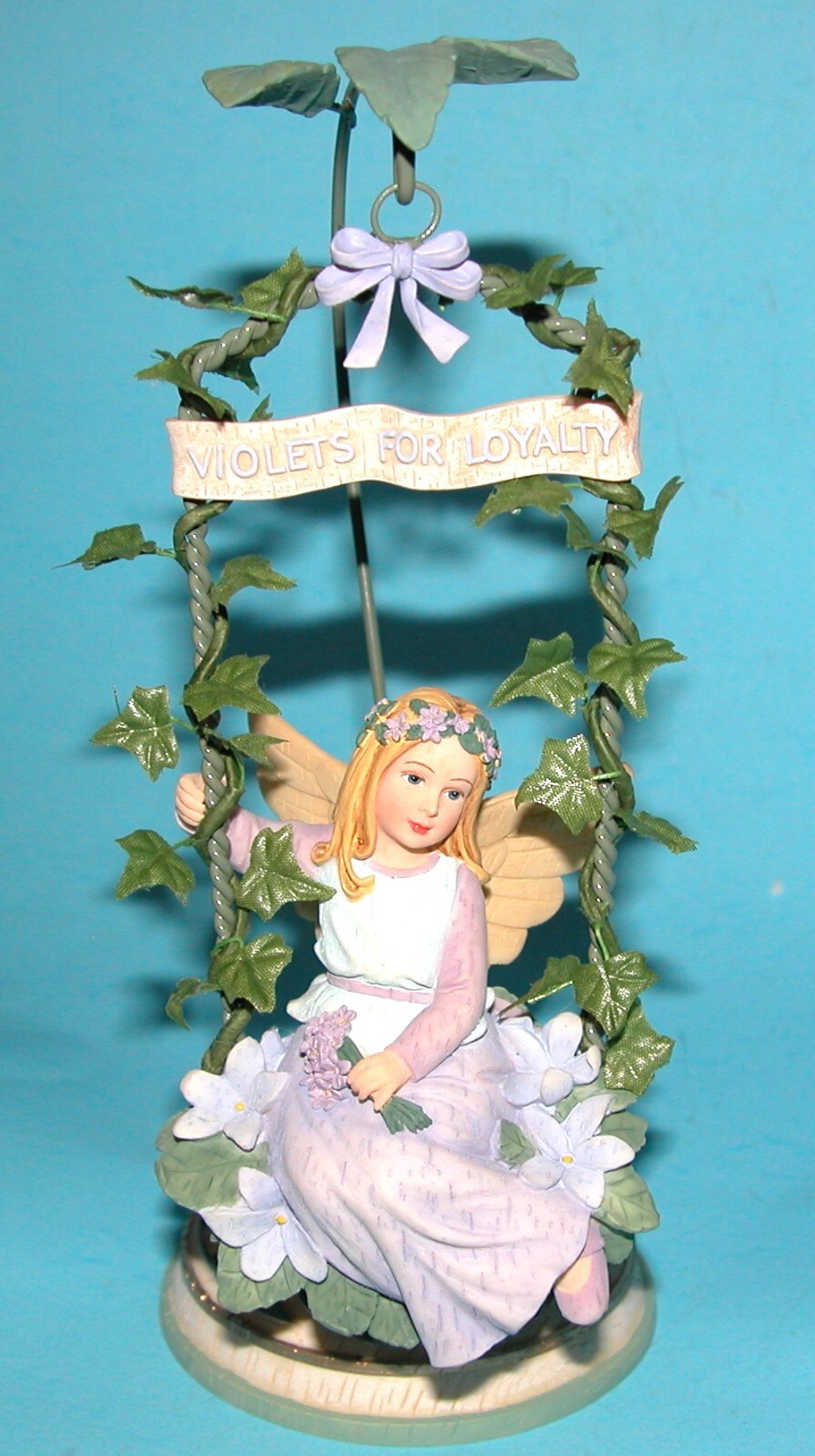 Demdaco Wildflower Angel on swing Violets for Loyalty #36703 New in box 4x8.5in