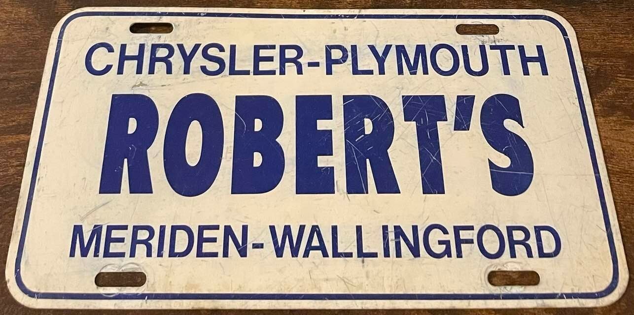Robert\'s Chrysler Plymouth Dealership Booster License Plate Meriden Wallingford