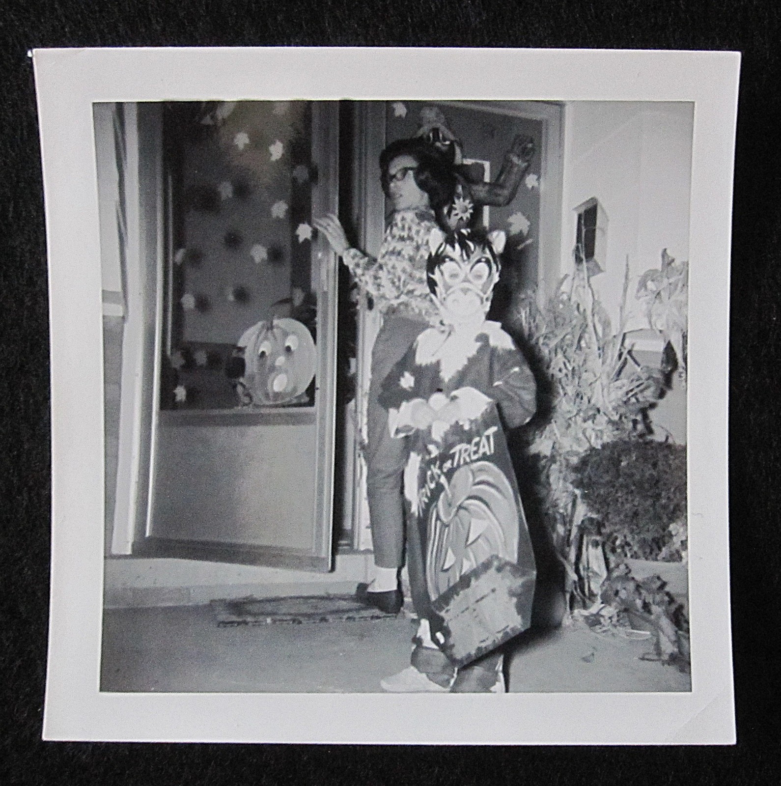 Vintage Snapshot Photo Child in Halloween Costume Trick or Treating