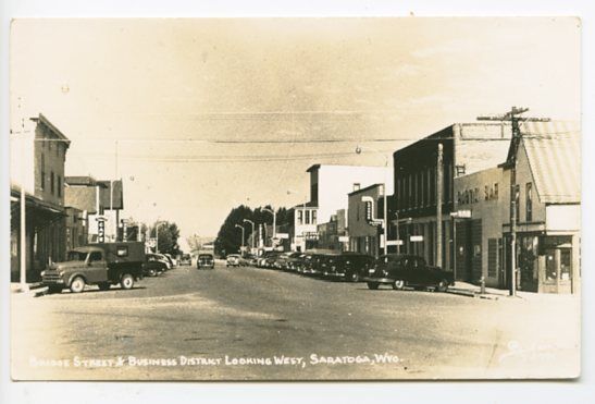 Saratoga WY Bridge Street Store Fronts Old Cars RPPC Real Photo Postcard