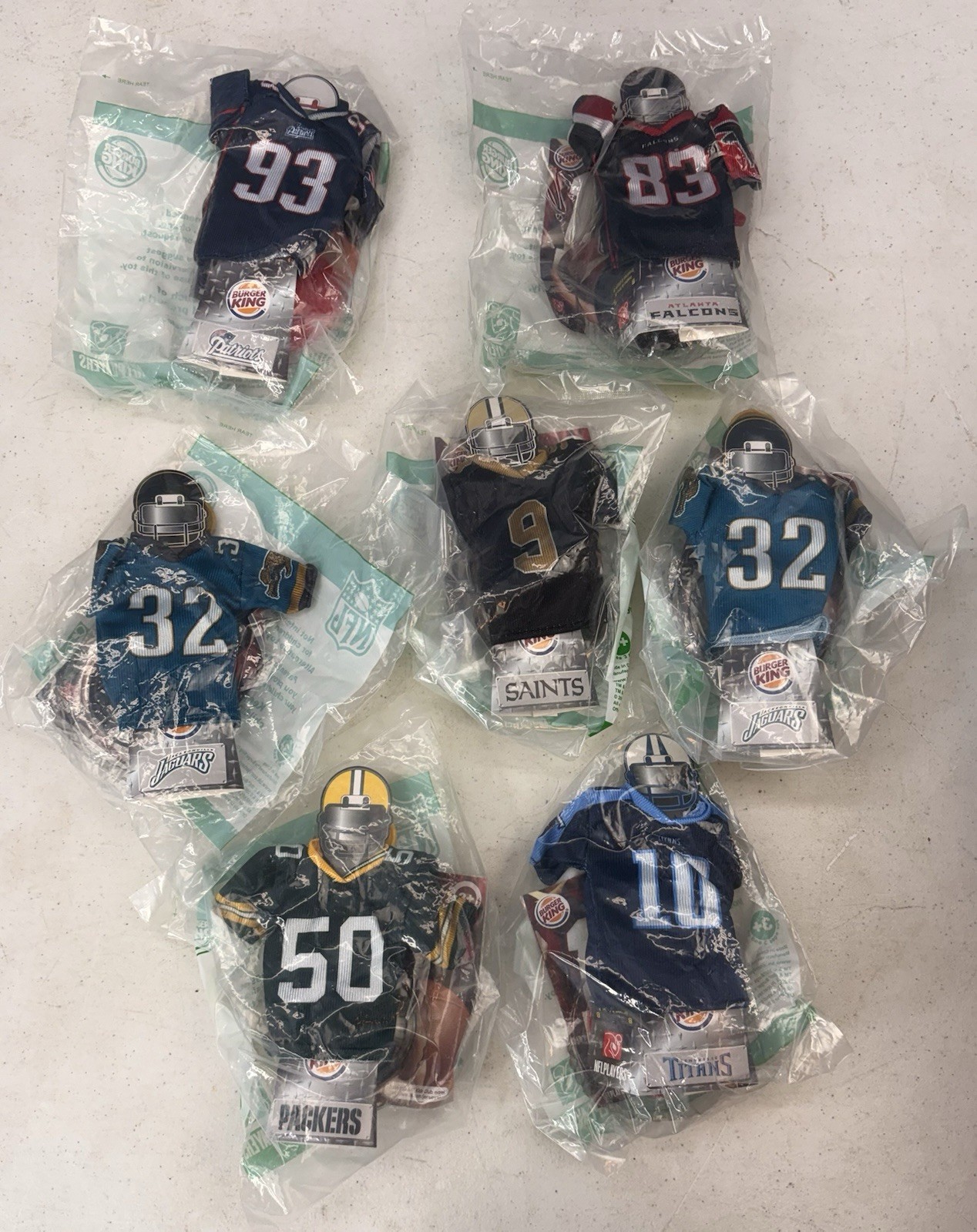 7 Burger King Sealed NFL Mini Jerseys: 93, 83, 32, 9, 50, 10